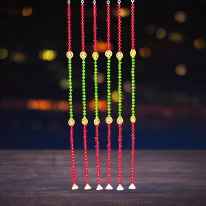 red-green-pompom-diwali-latkan-with-swastik-golden-ganti-door-hanging