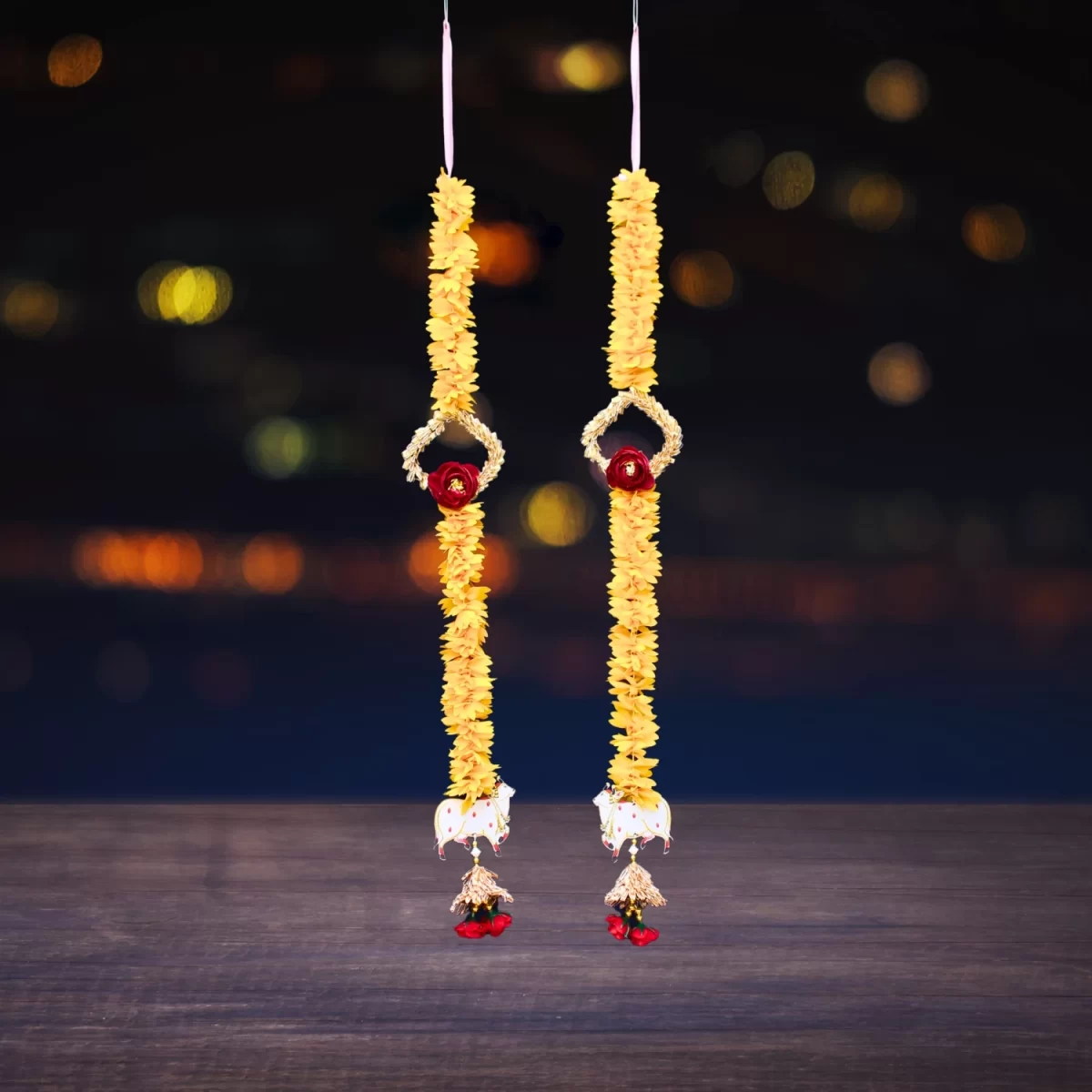 decorative-marigold-latkan-with-red-rose-door-hanging-for-diwali-weddings
