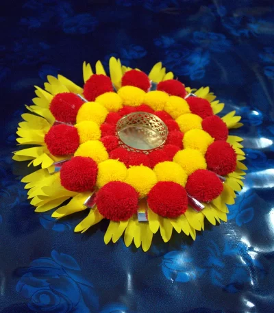 decorative-pompom-rangoli-with-diya-holder