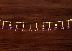 golden-door-toran-with-pom-poms-bells