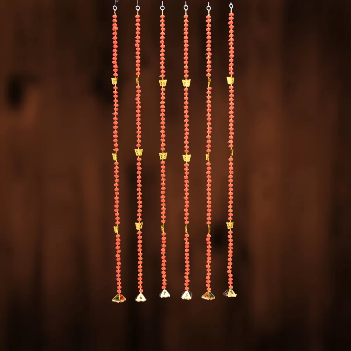 pompom-door-hanging-with-golden-butterfly