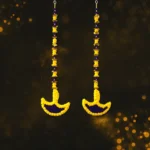 yellow-blue-pom-pom-diya-shape-latkan-for-diwali-decoration